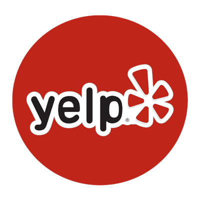 Yelp logo in white on a red circular background