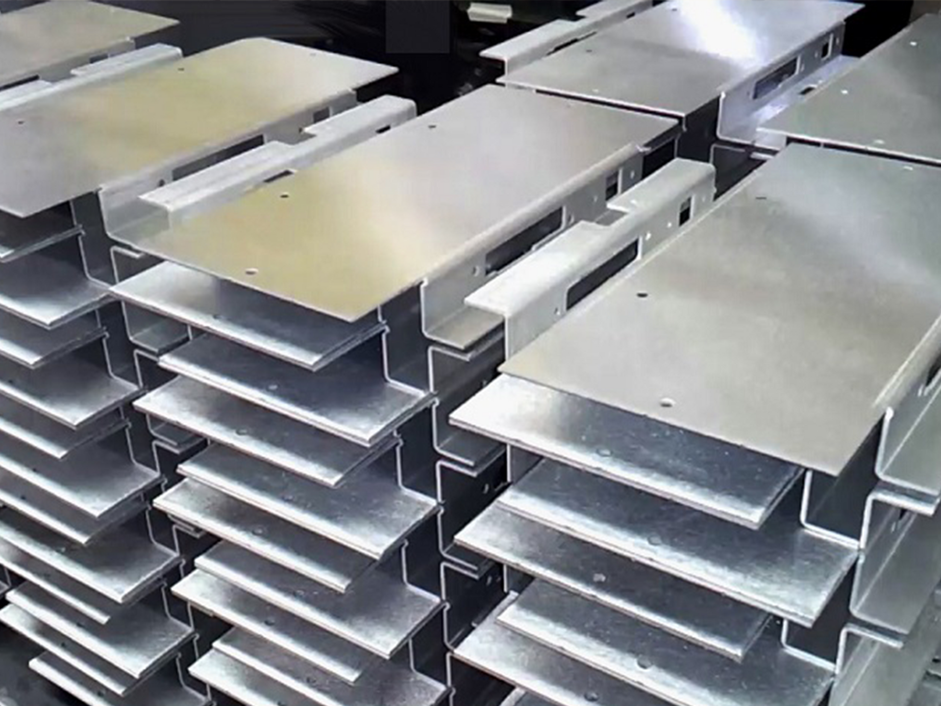 A bunch of metal pieces are stacked on top of each other.