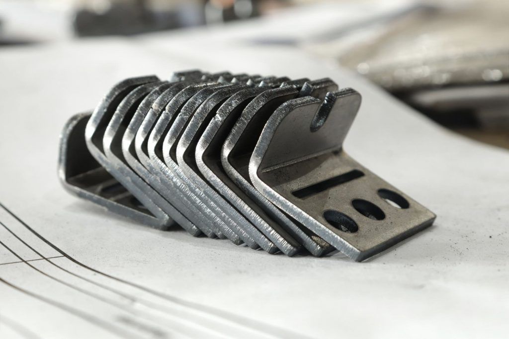 A bunch of metal pieces are stacked on top of each other.