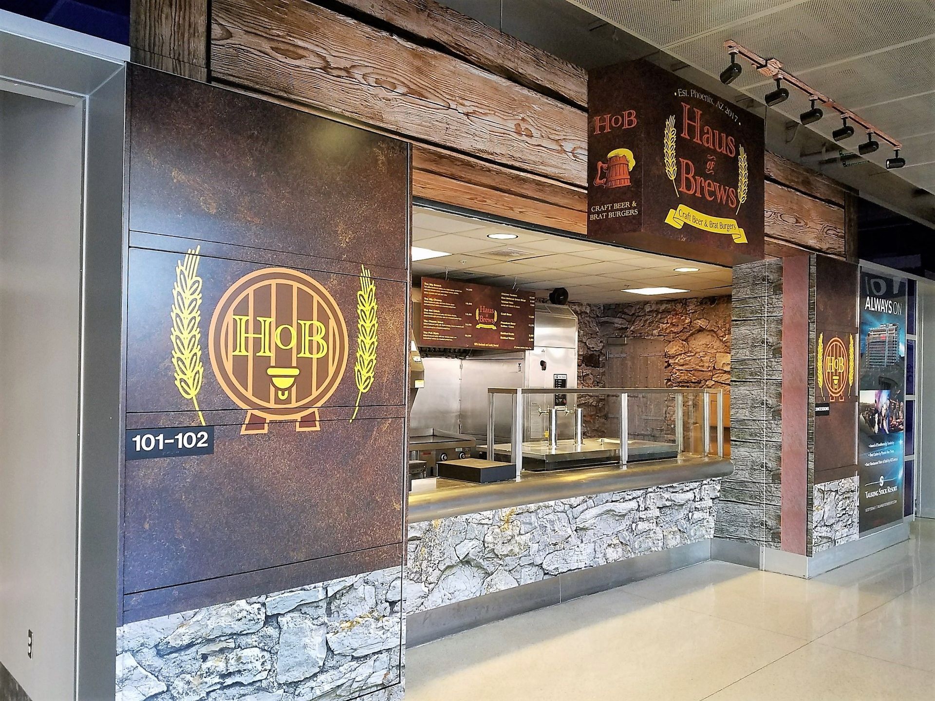 A restaurant with a sign that says' hard & brew' on it.