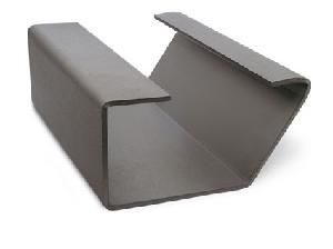 A close up of a metal pipe on a white background.