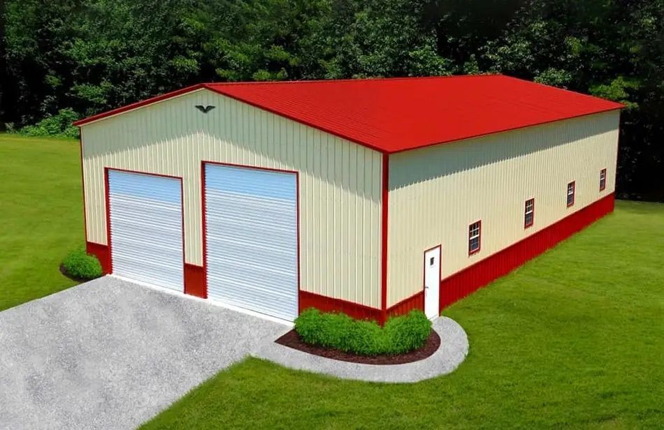 A white building with a red roof and white doors