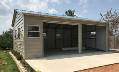a metal garage with two garage doors