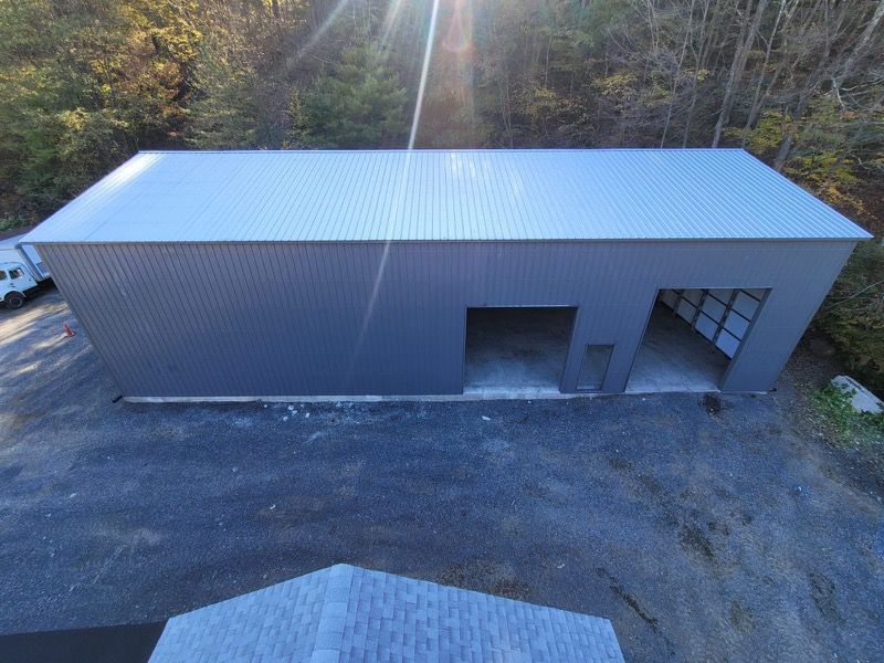 An aerial view of a large metal building