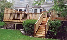 Wooden Deck With Hot Tub And Stairs