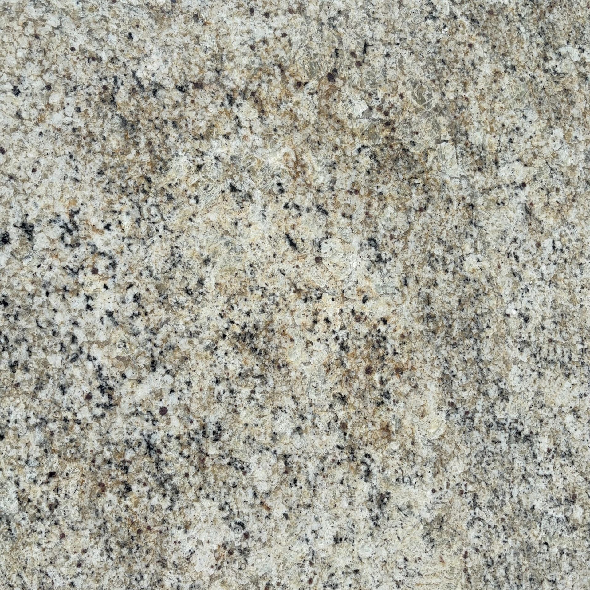 A close up of a granite surface with a lot of small stones
