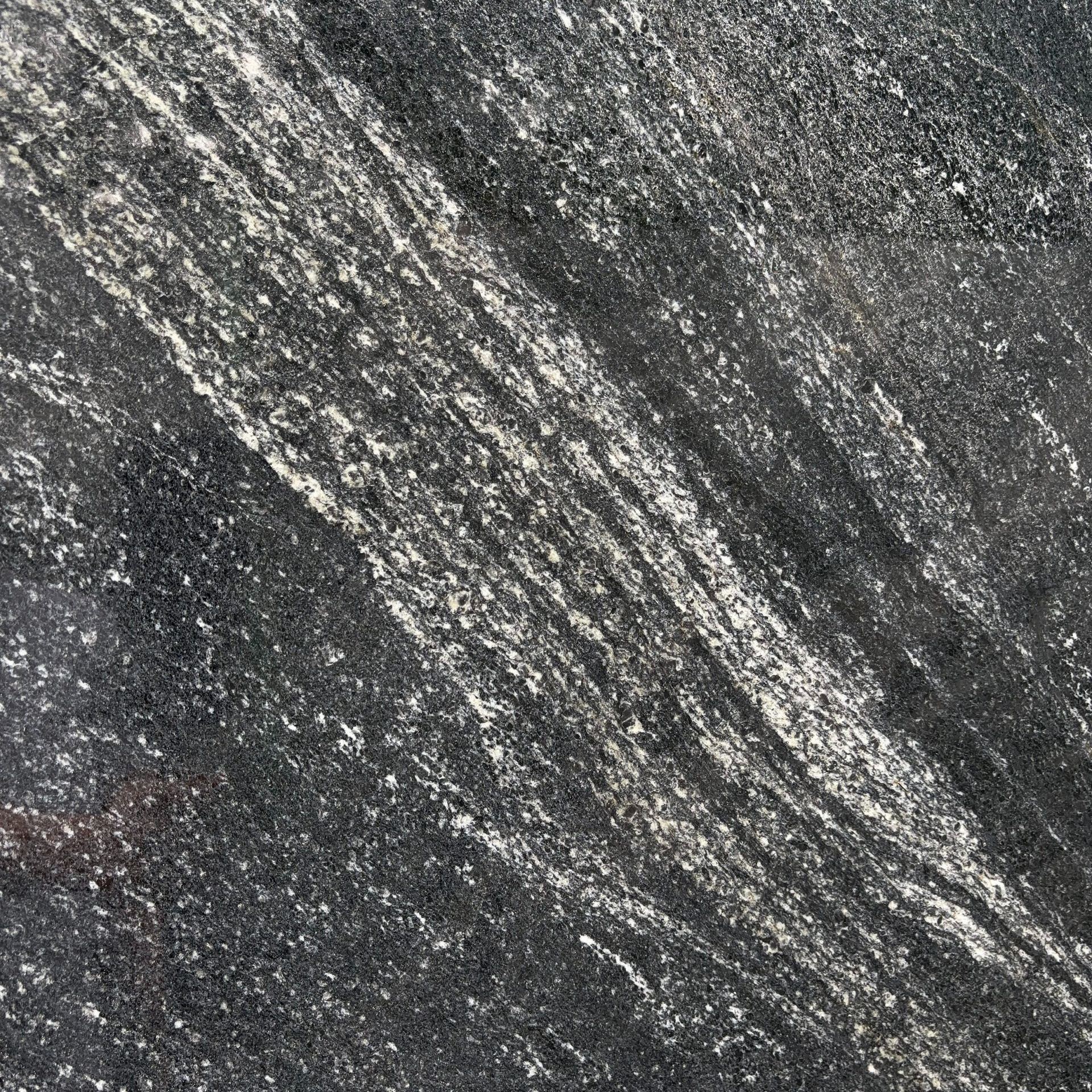 A close up of a black and white marble texture.