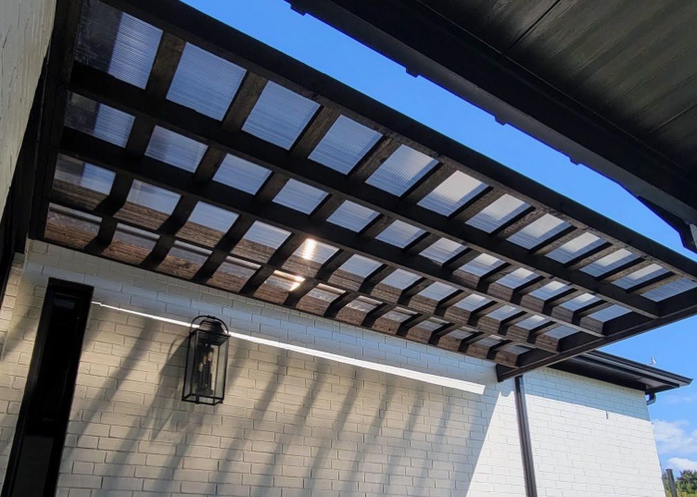 MODERN PERGOLA, LEDGER BOARD ATTACHED, POLYCARBONATE ROOF