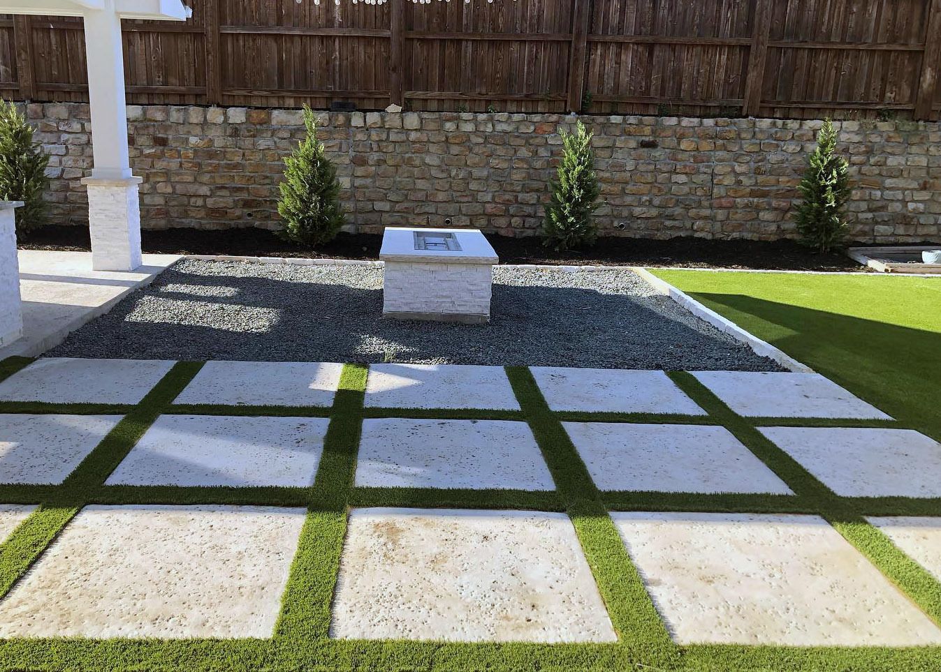 TURF BORDERING CONCRETE SLABS