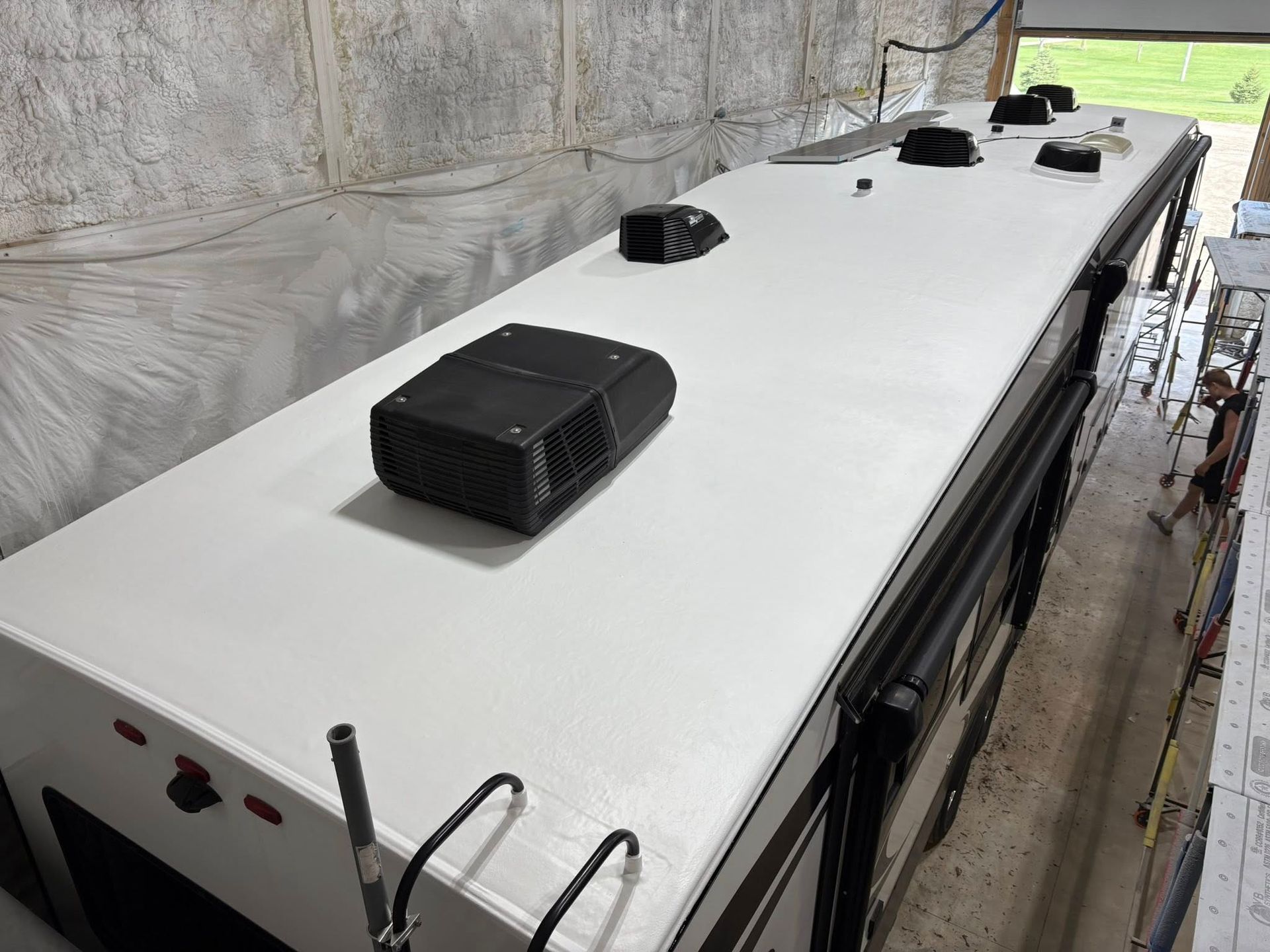 A black box is sitting on top of a white table.