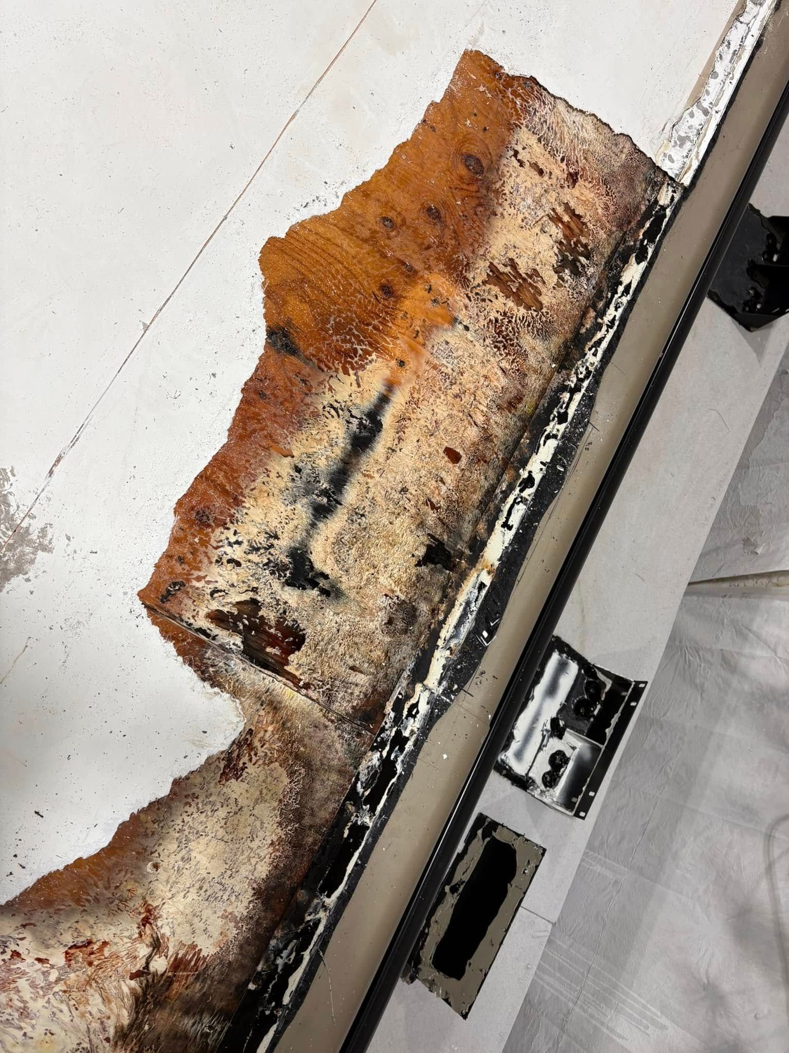 A piece of cake is sitting on top of a table.