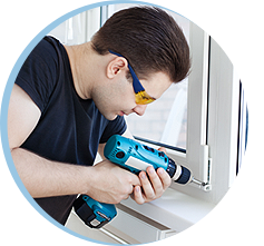 Repairman fixing Window
