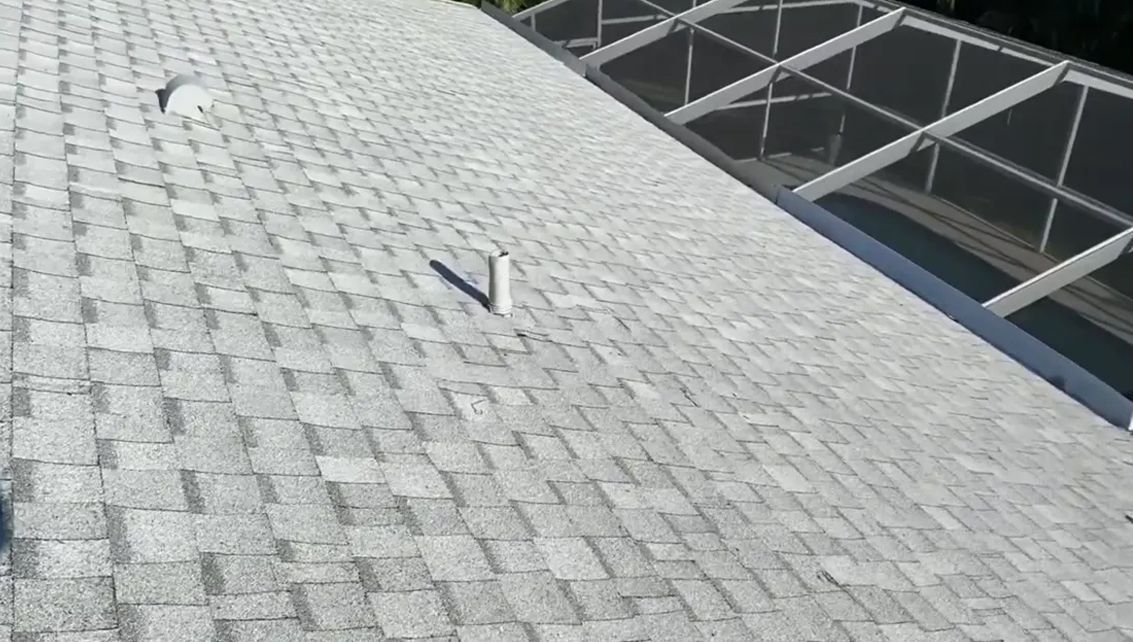 A close up of a roof with shingles on it.