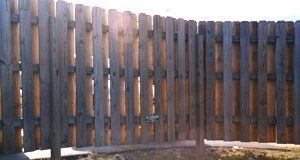 Dark wooden fence