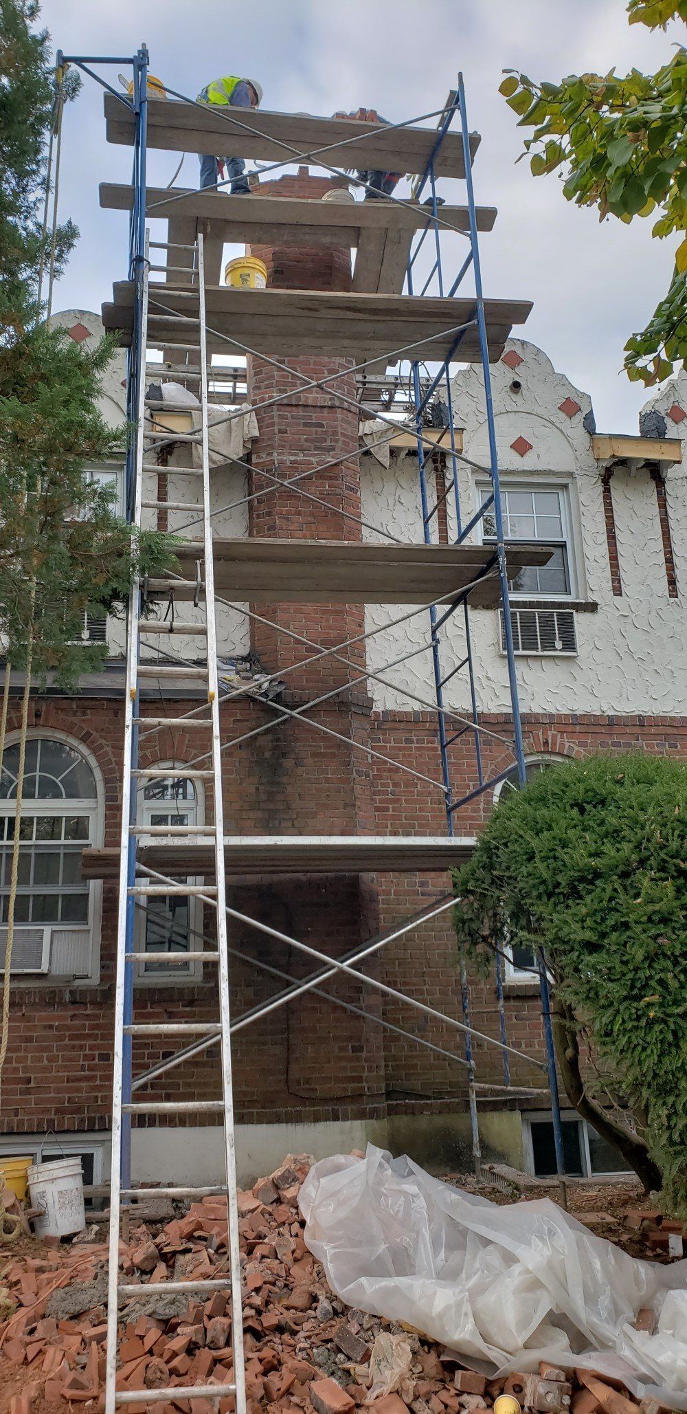 American chimney services van is parked on the side of the road.