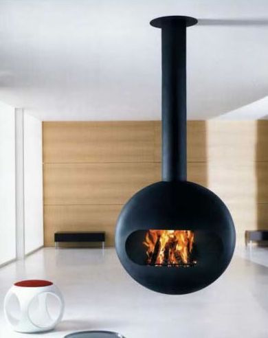 A fireplace is hanging from the ceiling in a living room