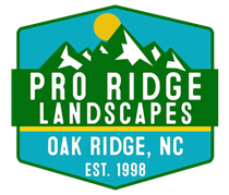 Logo for Pro Ridge Landscapes: green mountains, yellow sun, white text on turquoise hexagon, "Oak Ridge, NC".