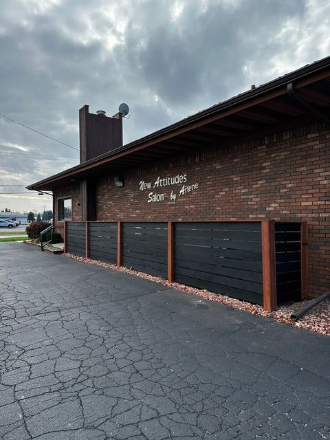 A brown brick building labeled 