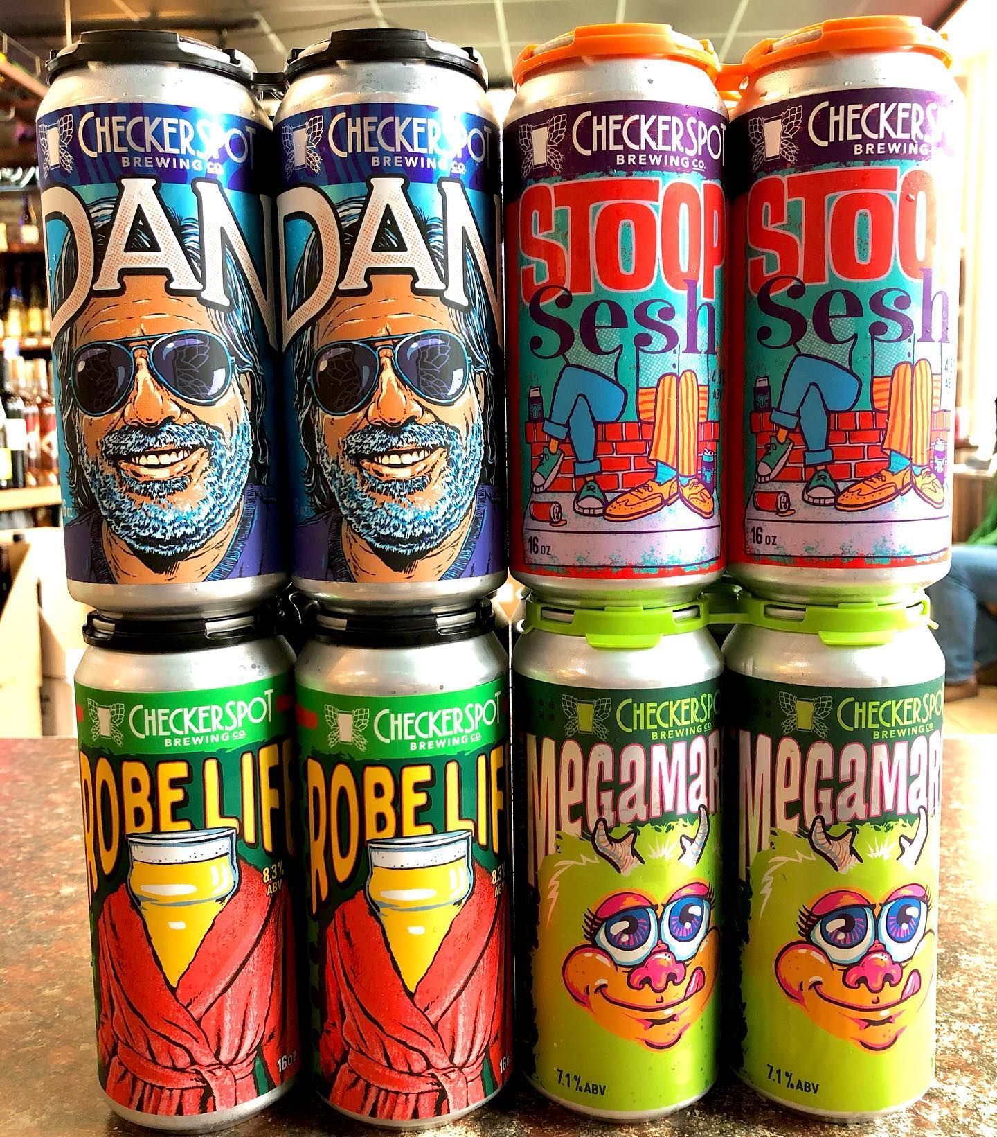 Six colorful craft beer cans stacked in a 2x3 grid, with illustrated labels in orange, green, blue, and red.