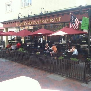 People are sitting outside of el centro mexican restaurant