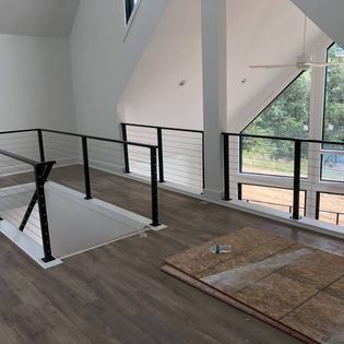 There is a staircase leading up to the second floor of a house.