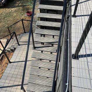 An aerial view of a set of stairs leading up to a building.