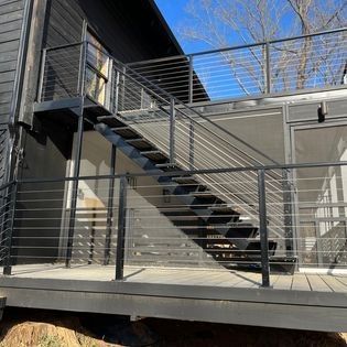 There is a staircase leading up to the second floor of a house.