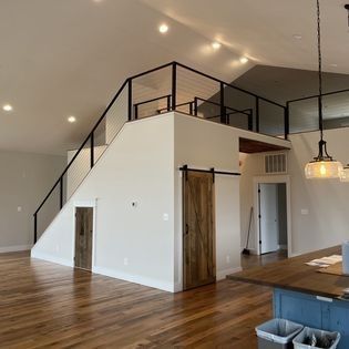 There is a staircase leading up to the second floor of the house.