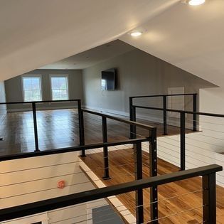 There is a staircase leading up to the second floor of a house.