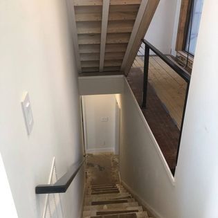 A staircase leading up to the second floor of a house.