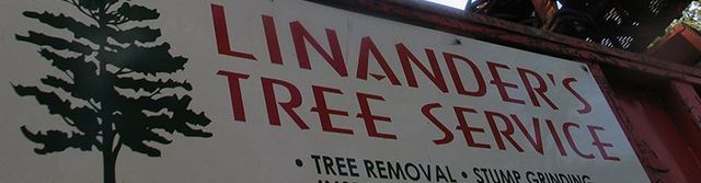 A sign for linander 's tree service with a tree on it