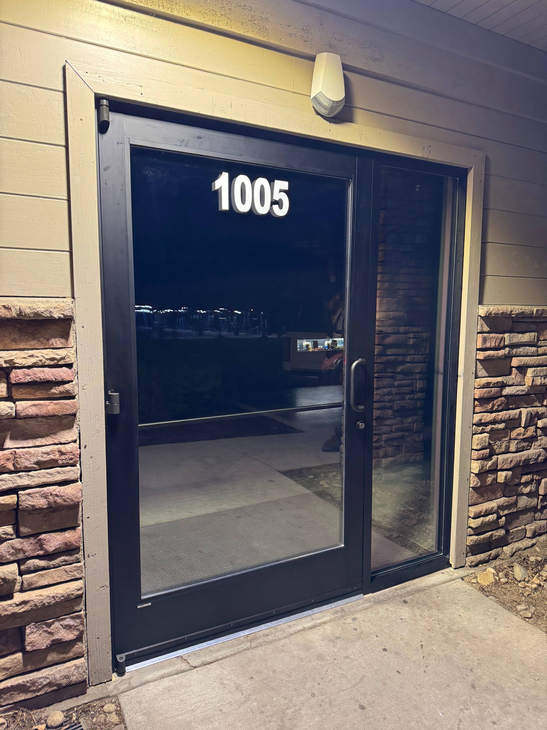 Exterior view of a door marked 