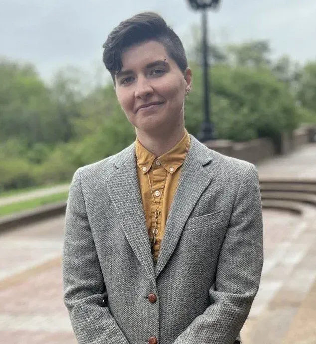 Photo of {{Team Member Name}}