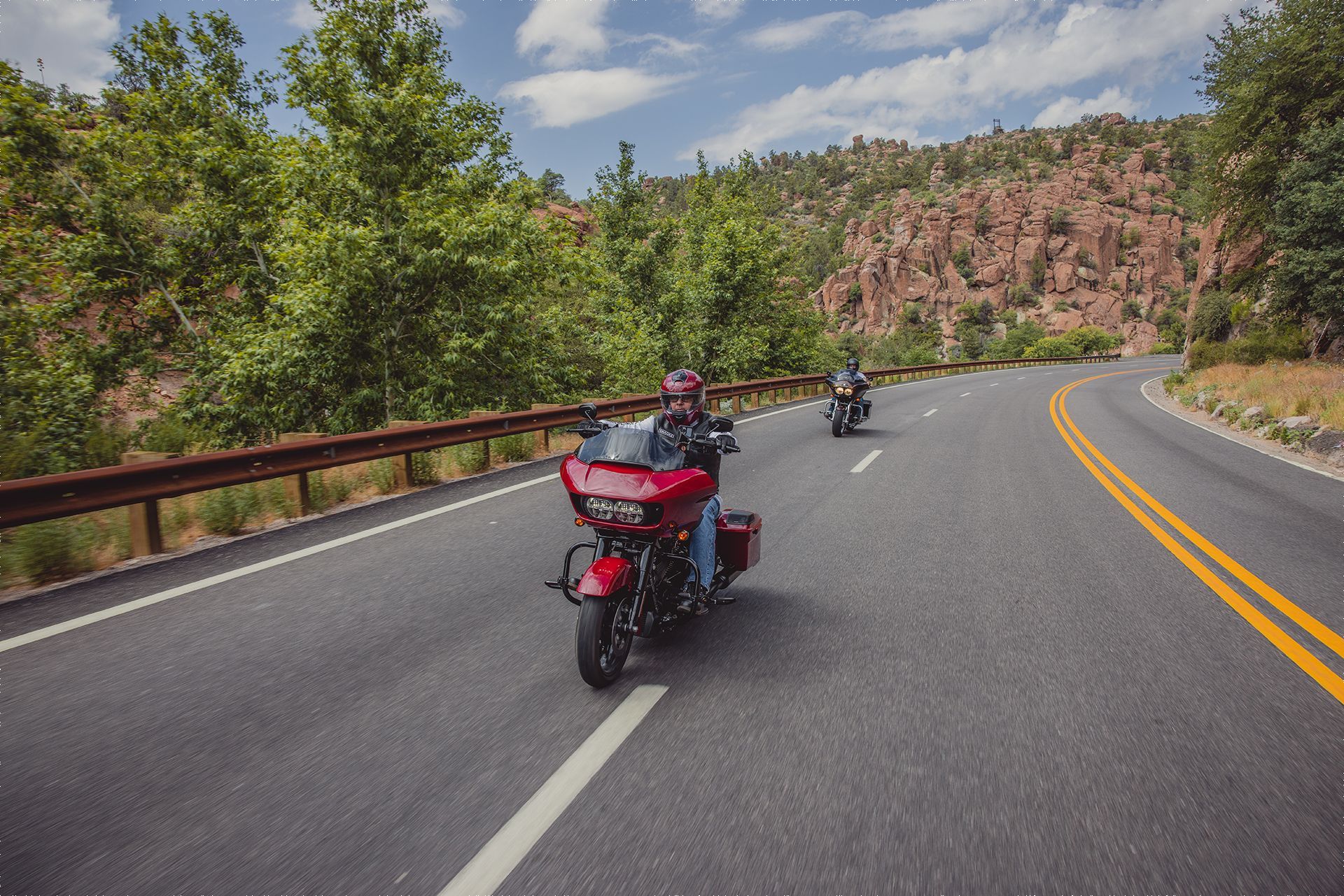 Driving red motorcycle