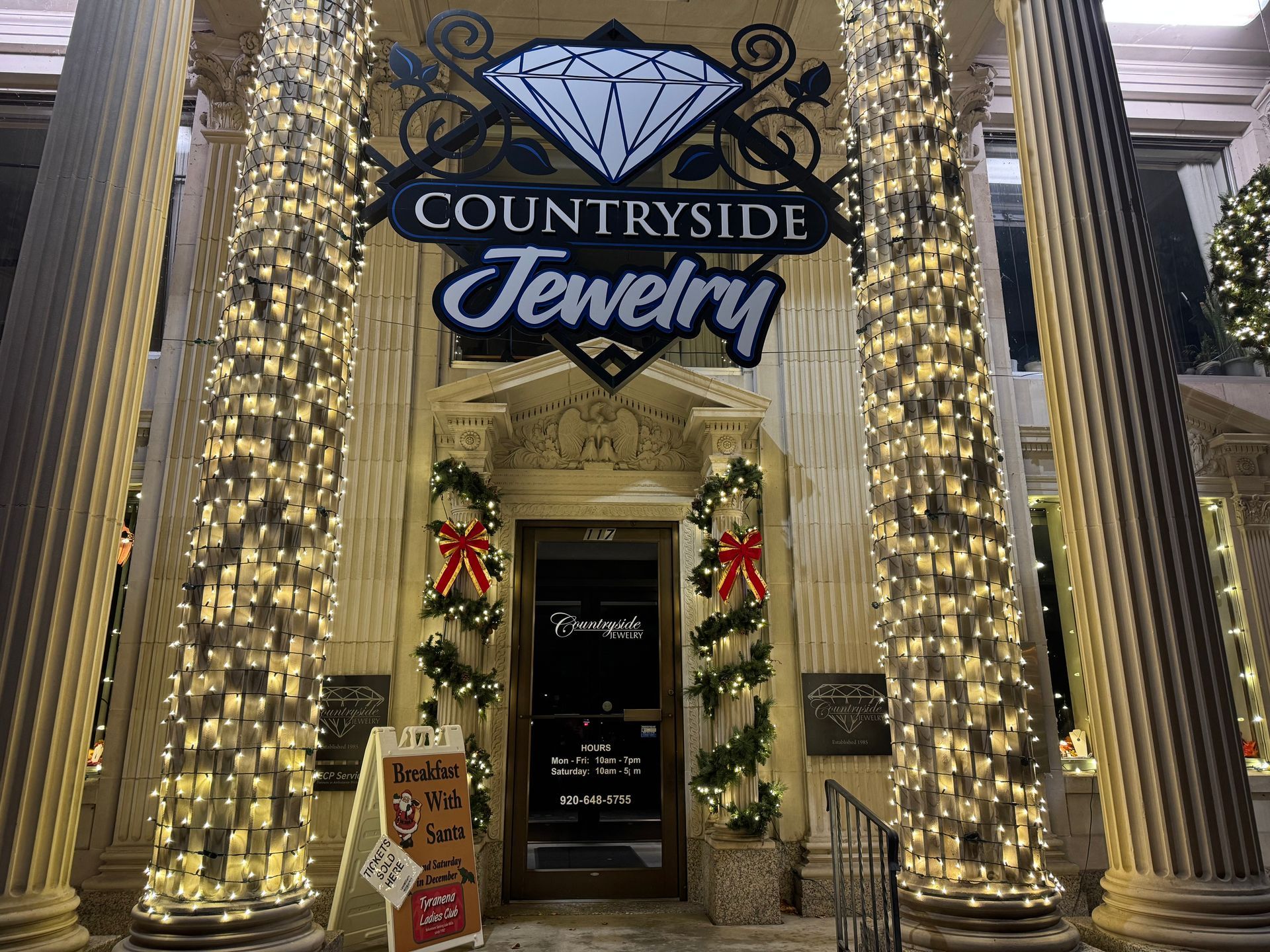 Countryside Jewelry storefront with glowing lights, diamond sign, and decorated entrance