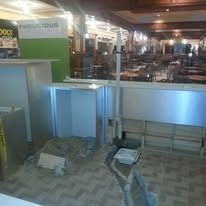 Construction in a commercial space, unfinished walls, and exposed building materials.