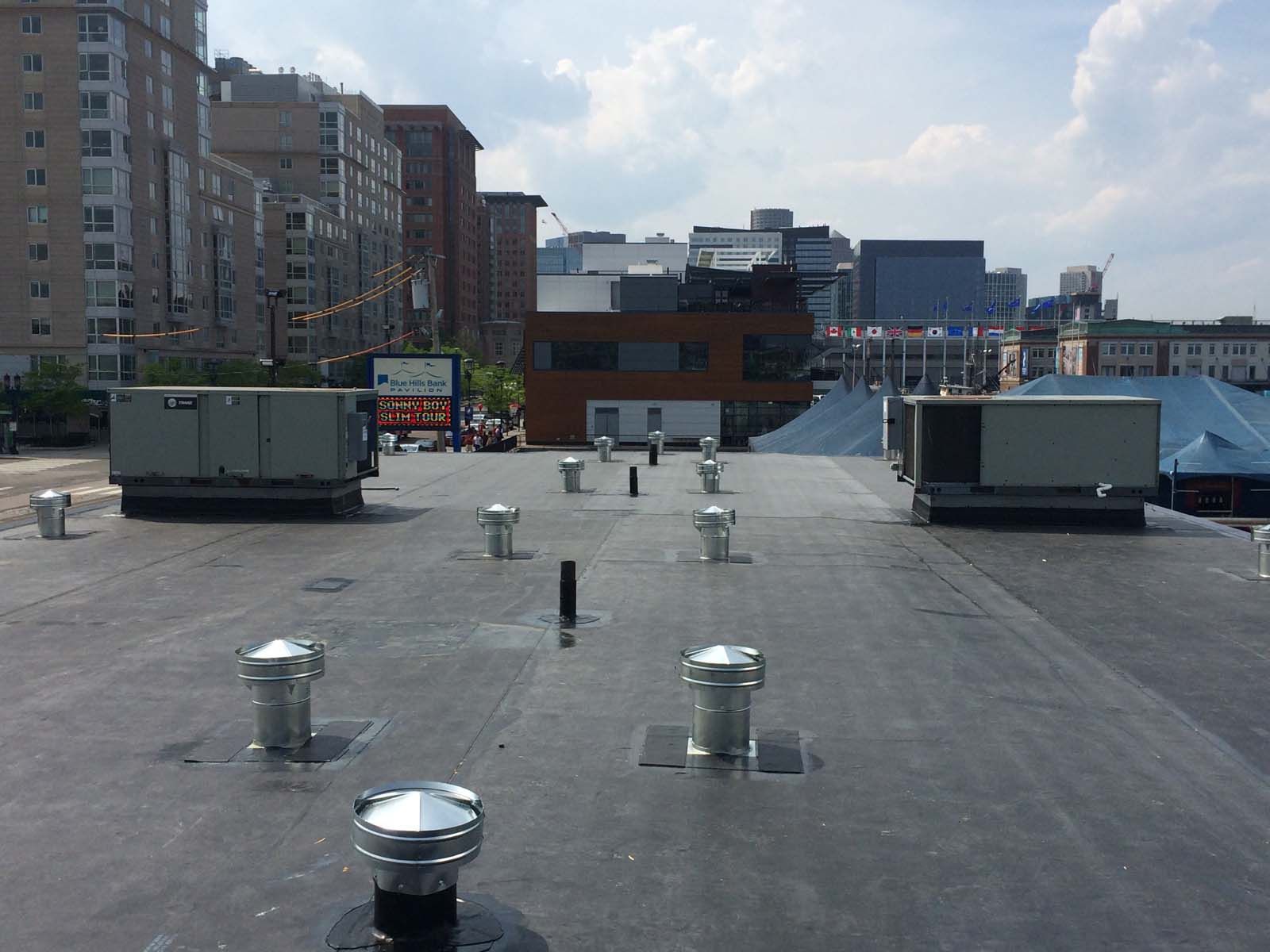The roof of a building with a lot of vents on it