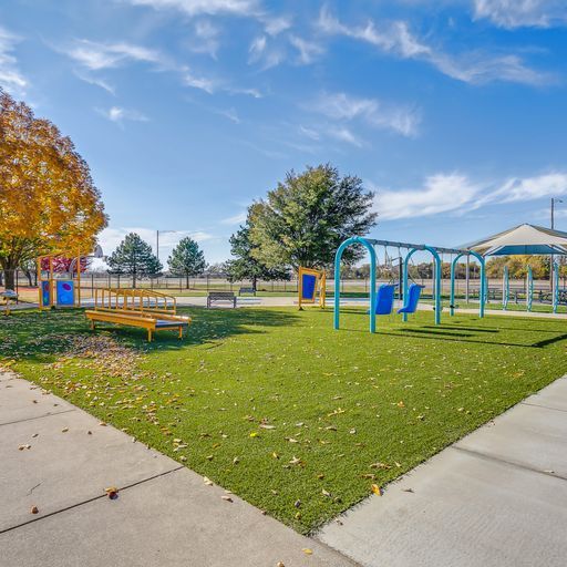 corner of a sidewalk with turf