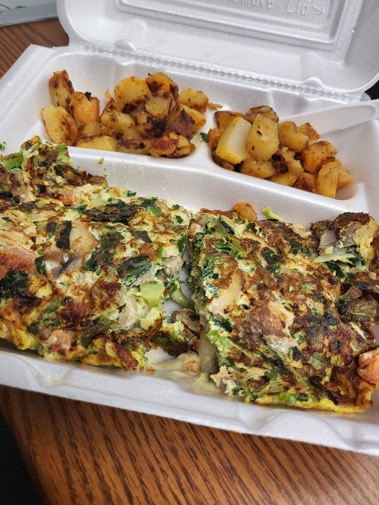 Veggie omelette with sausage and home fries
