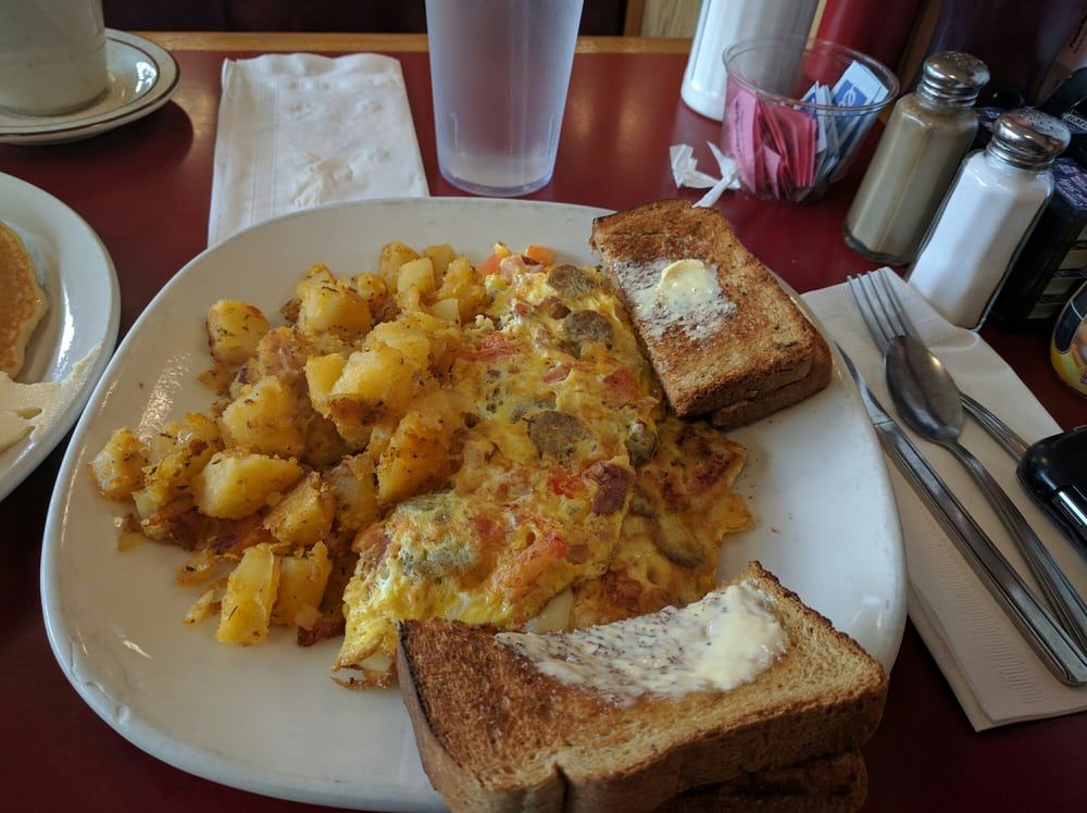 Breakfast meal with condiments