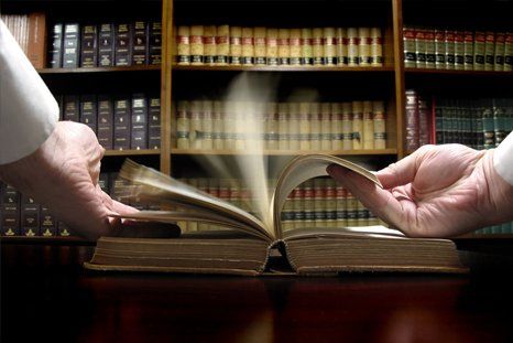 Lawyer reading law books