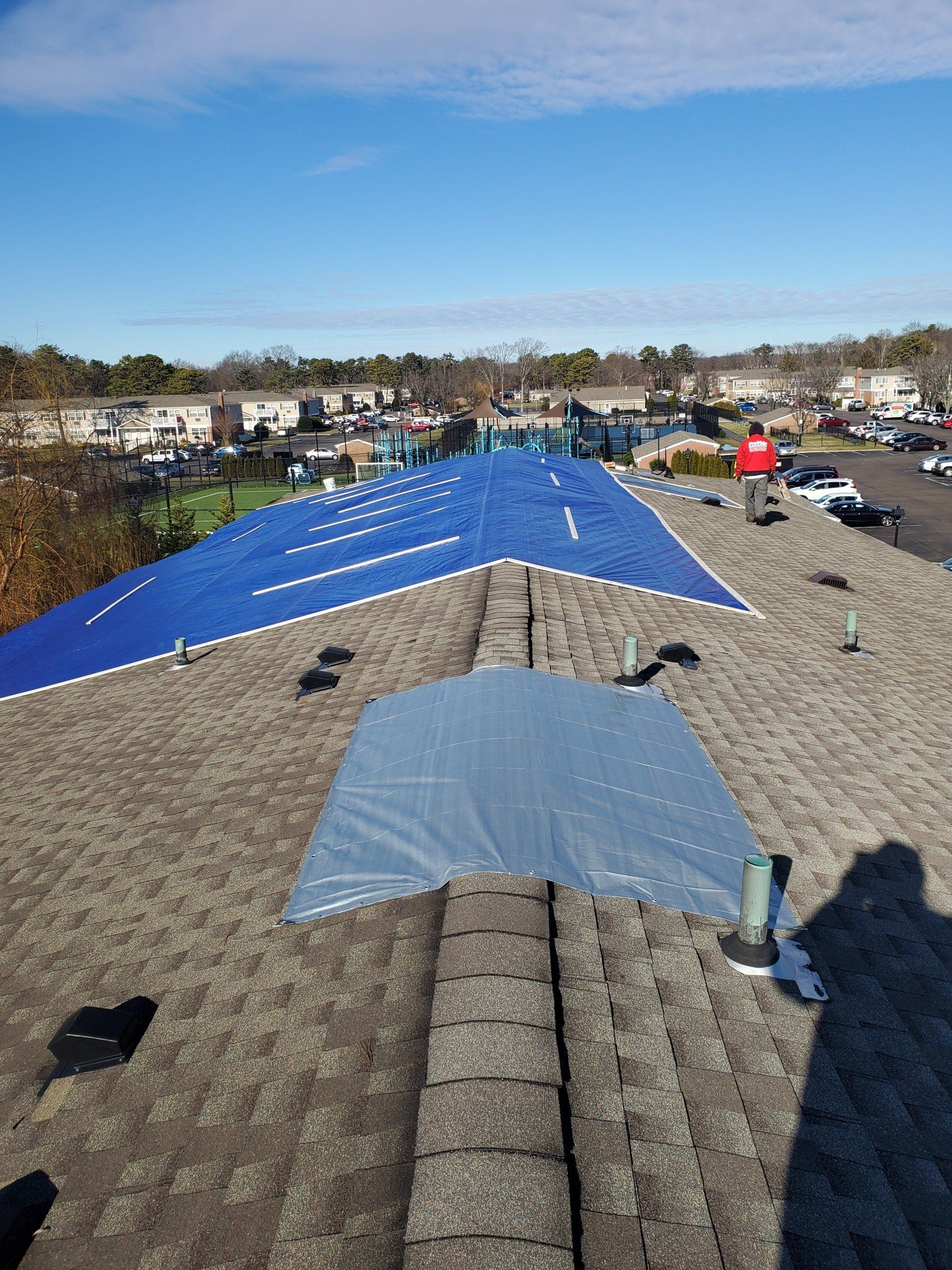 Residential roof tarping