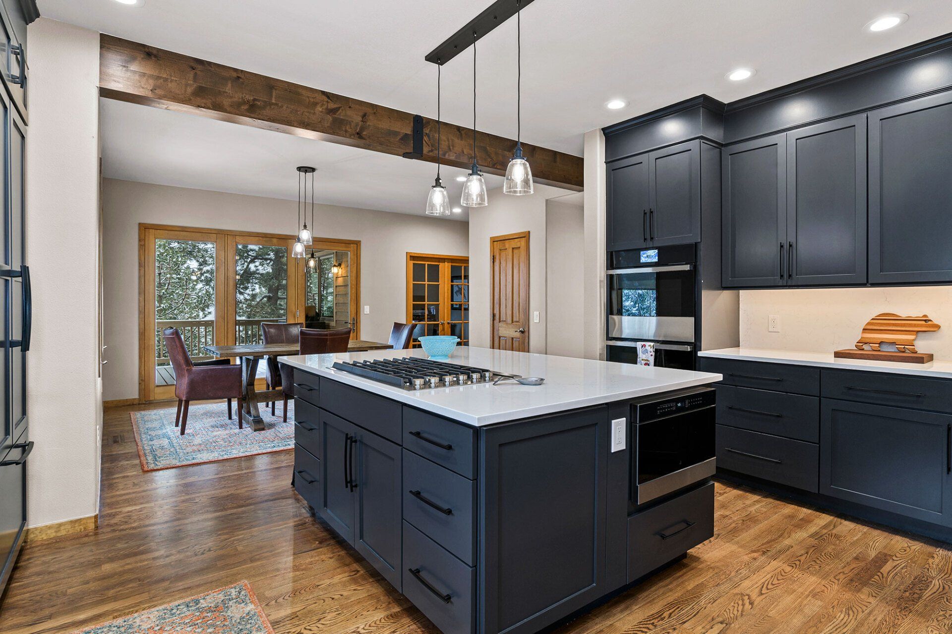 There is a large island in the middle of the kitchen.
