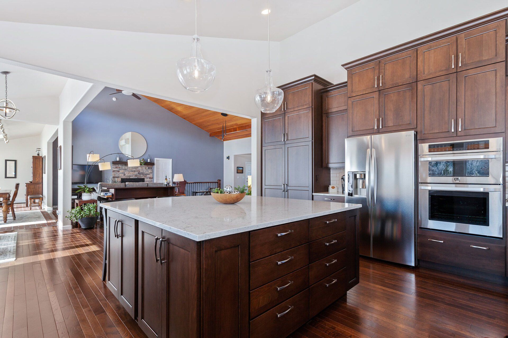 There is a large island in the middle of the kitchen.
