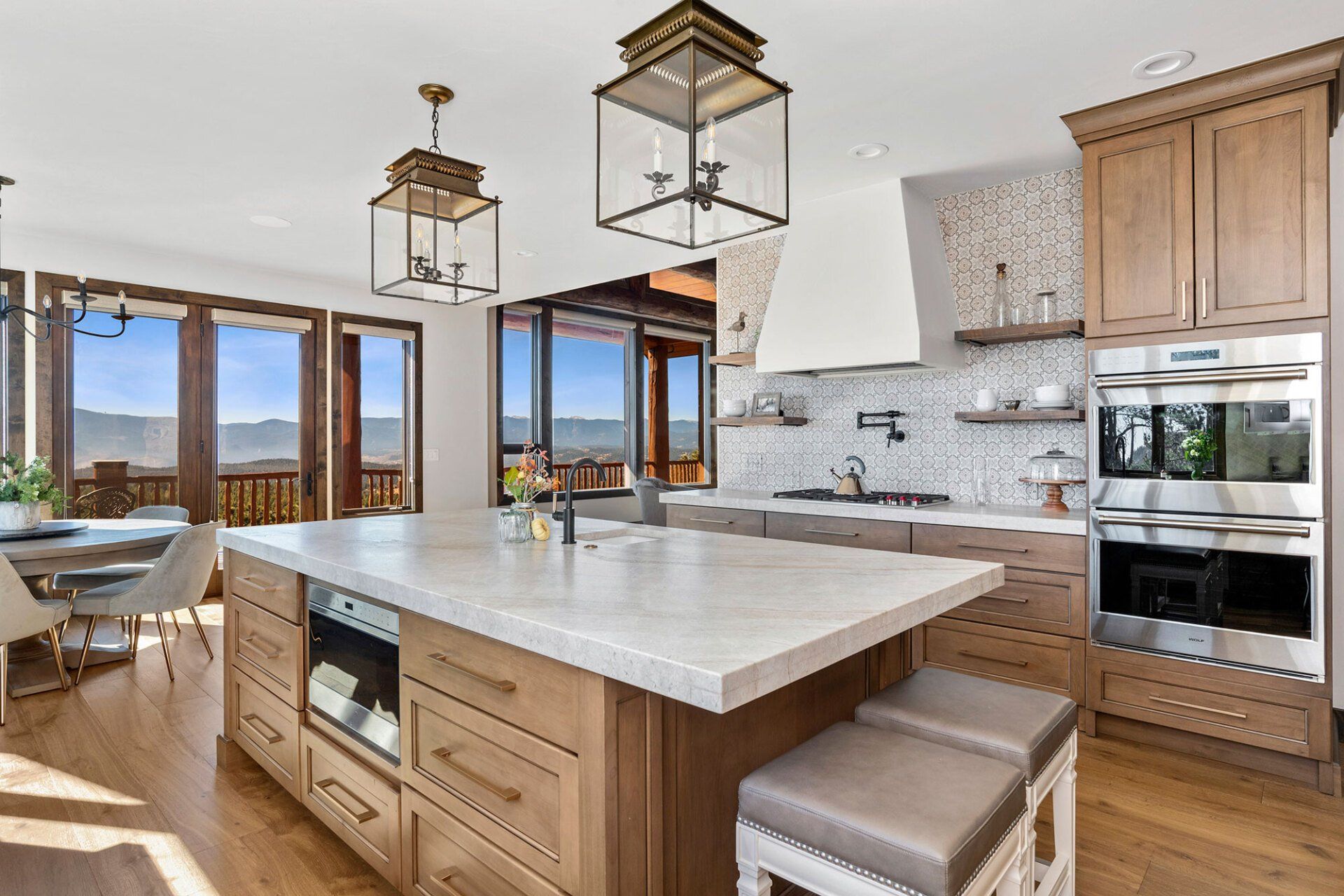 There is a large island in the middle of the kitchen.