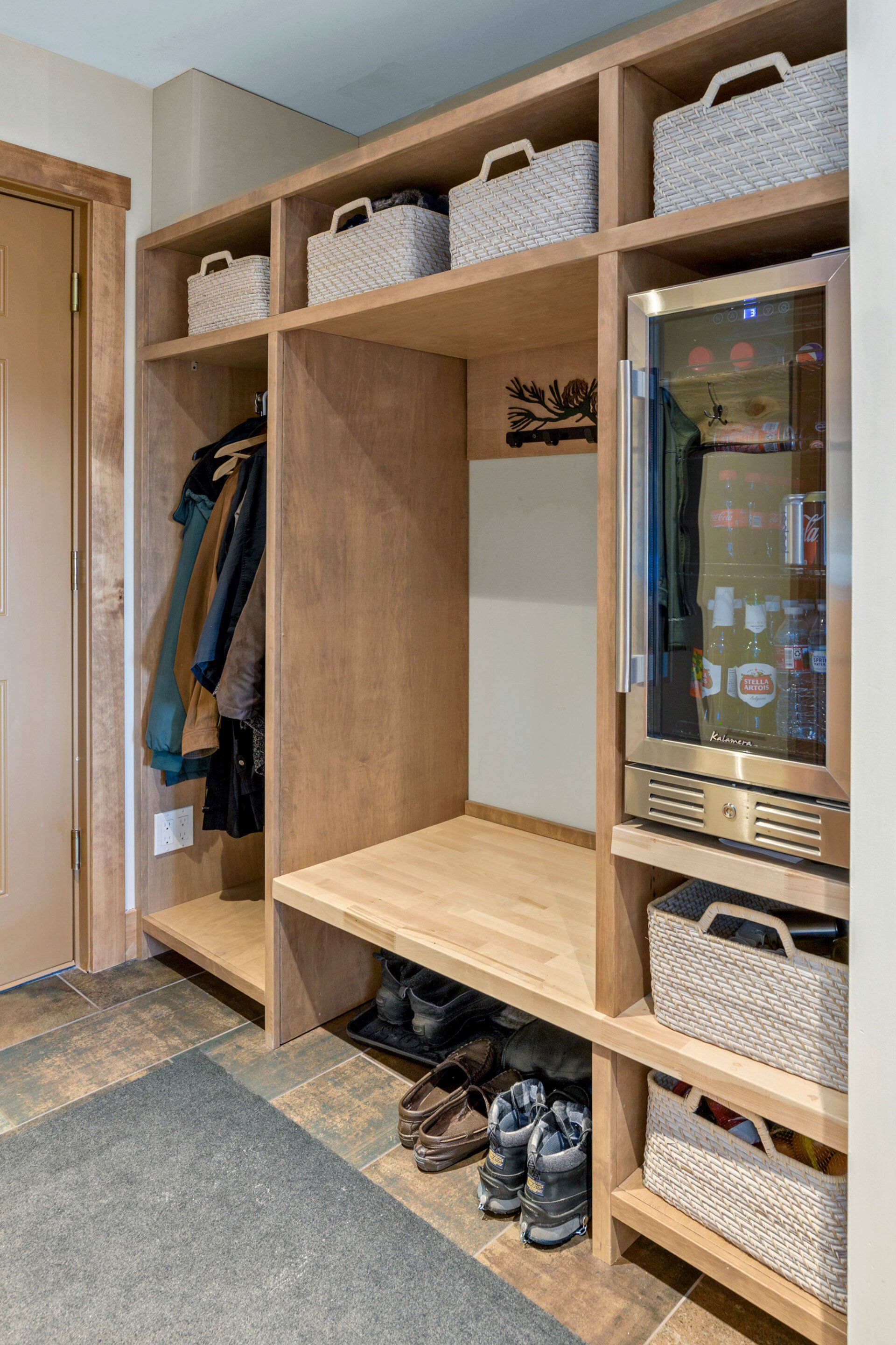 There is a wine cooler in the mud room.
