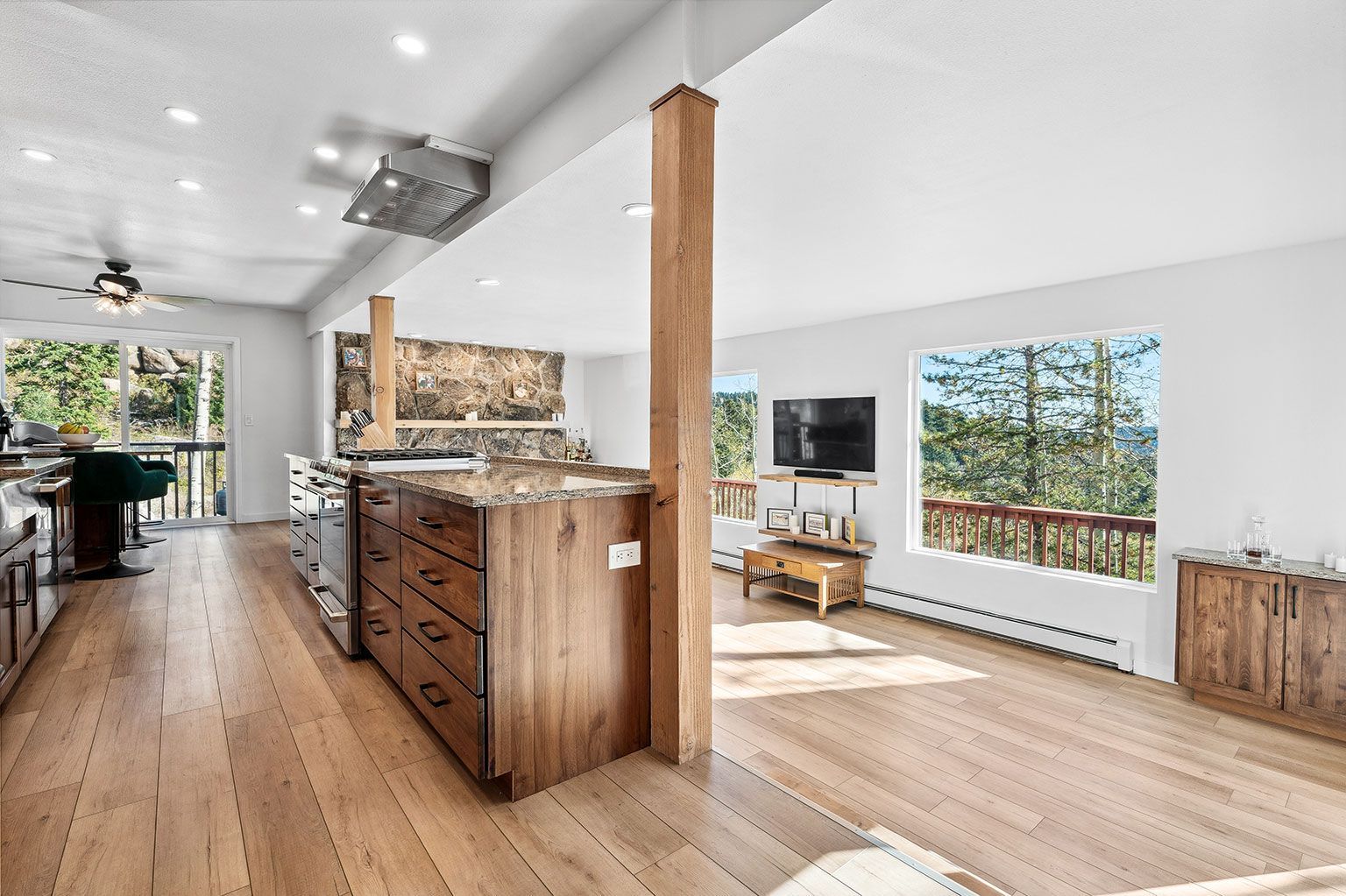 A kitchen with a large island in the middle of the room.