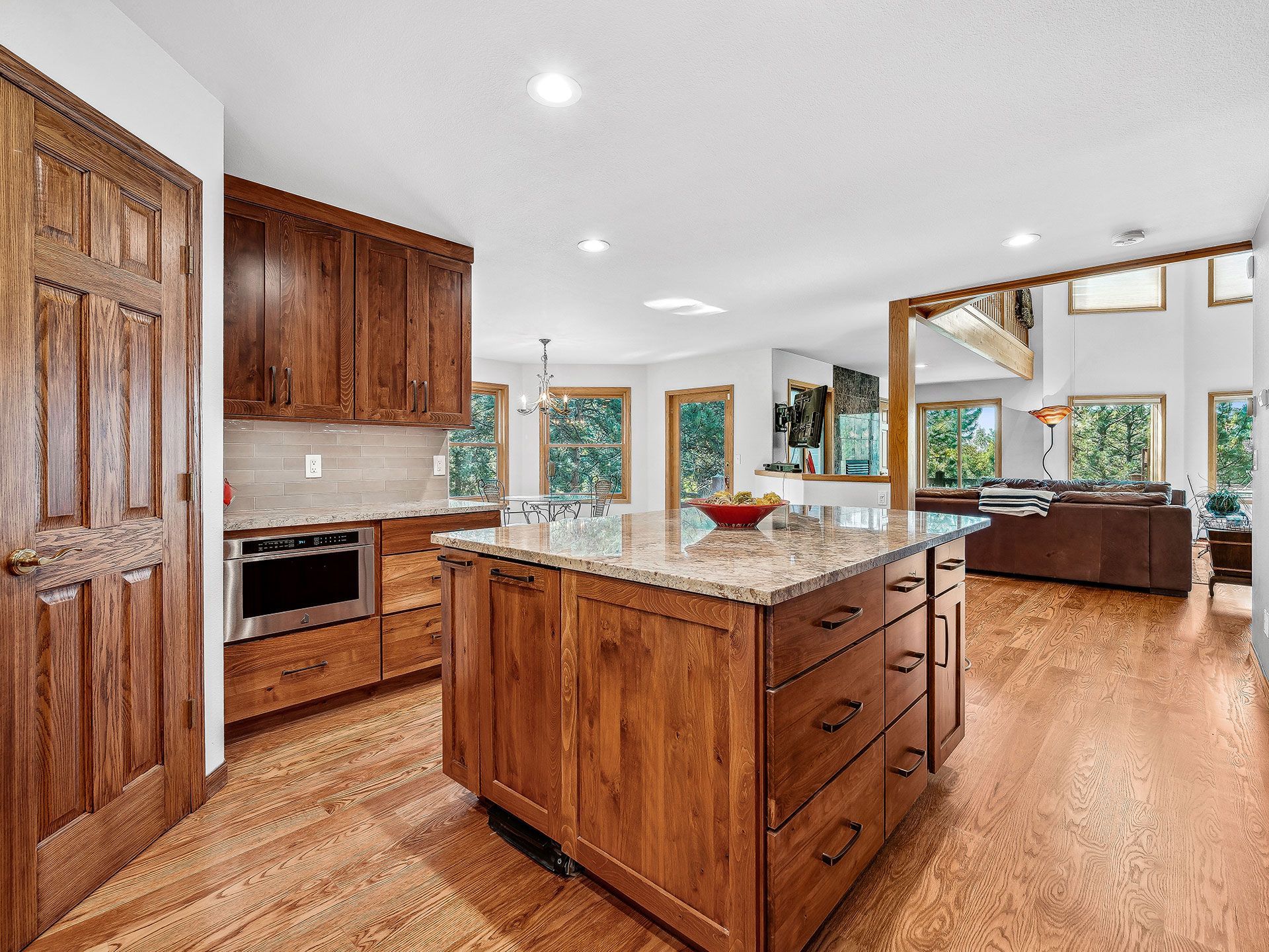 There is a large island in the middle of the kitchen.