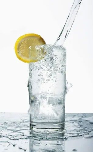Glass of water with lemon