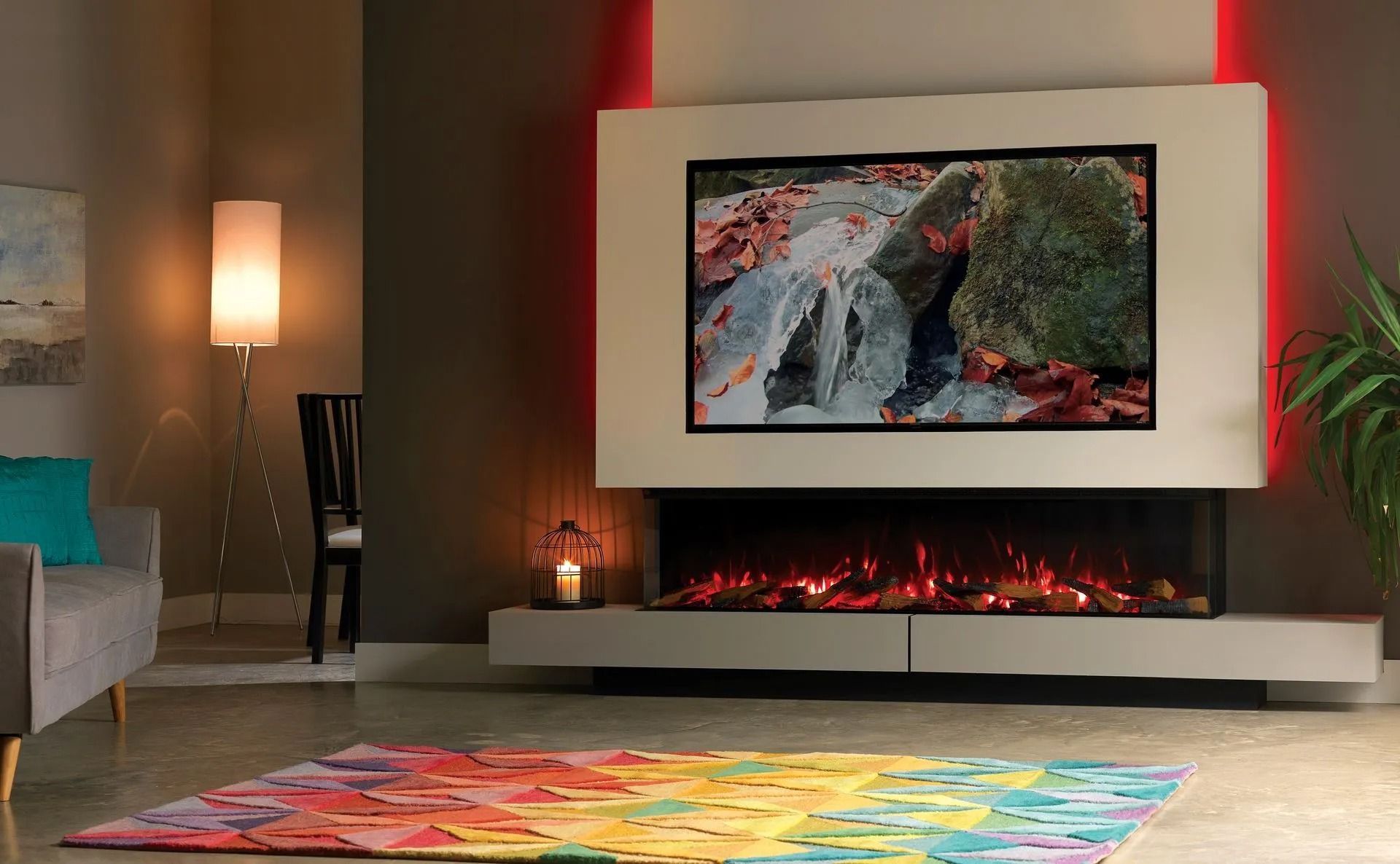 Modern living room with fireplace and mounted TV; colorful rug, muted tones, and soft lighting.